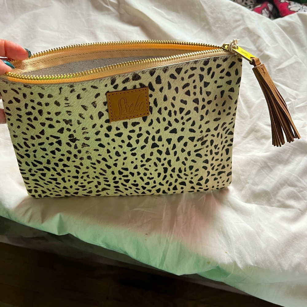Sseko Tassel Clutch in Fauna